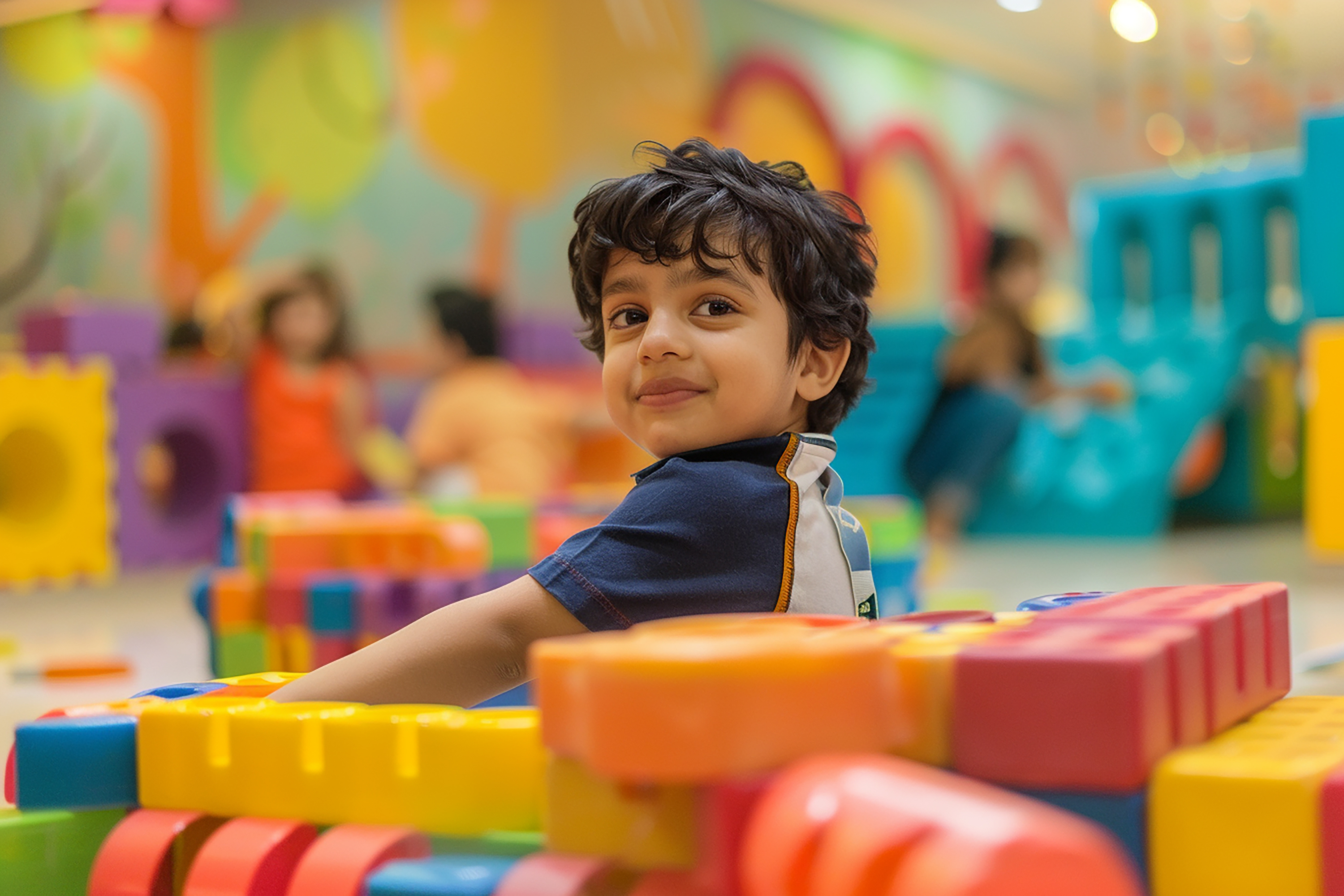 Children enjoying active indoor play at Cocomelos Kids Play Zone